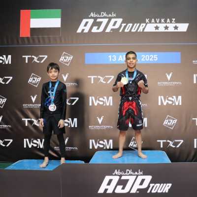 Mark Ghambaryan on the podium with gold medal at AJP Tour KAVKAZ 2025 – First Place Champion